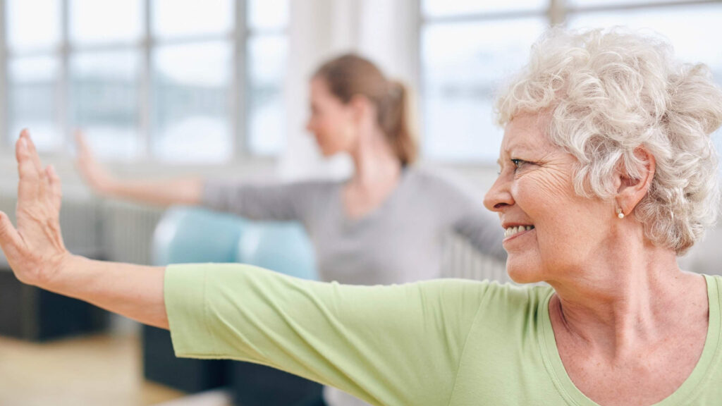 Woman doing chair yoga